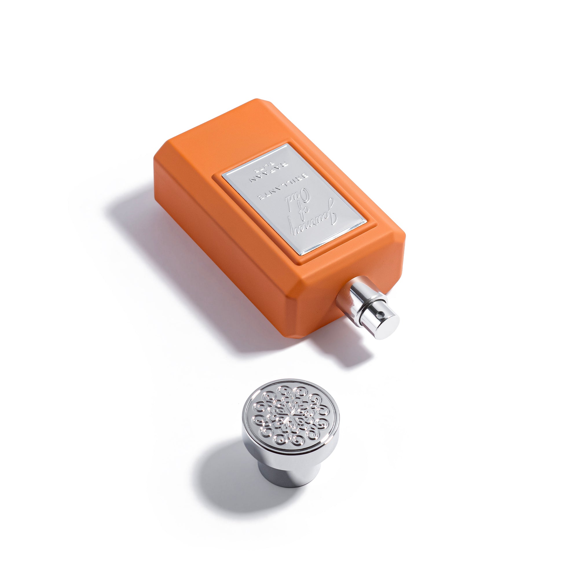 journey of oud brillante perfume with cap off on a white background