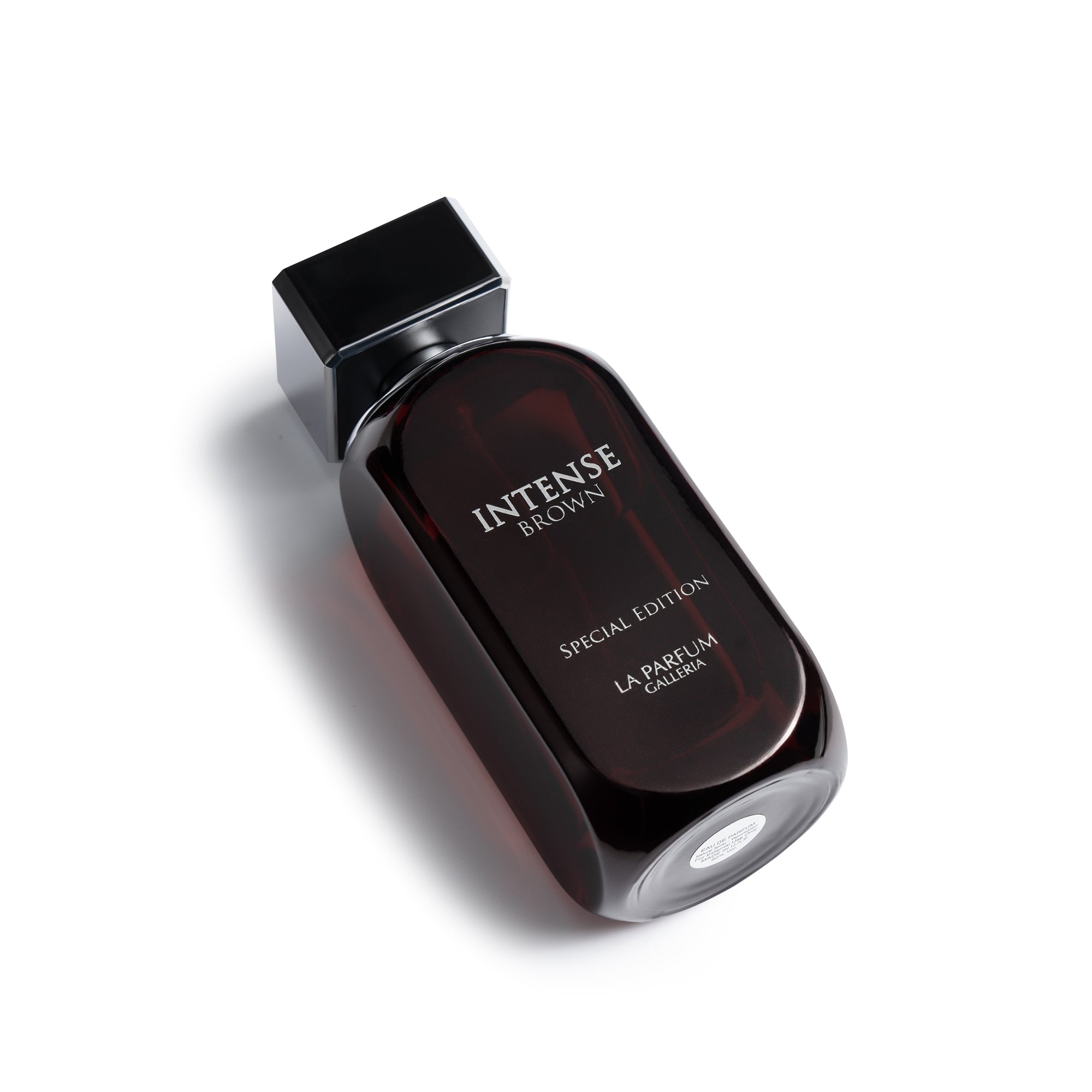 Intense Brown Perfume Bottle Lying Down By La Perfume Galleria