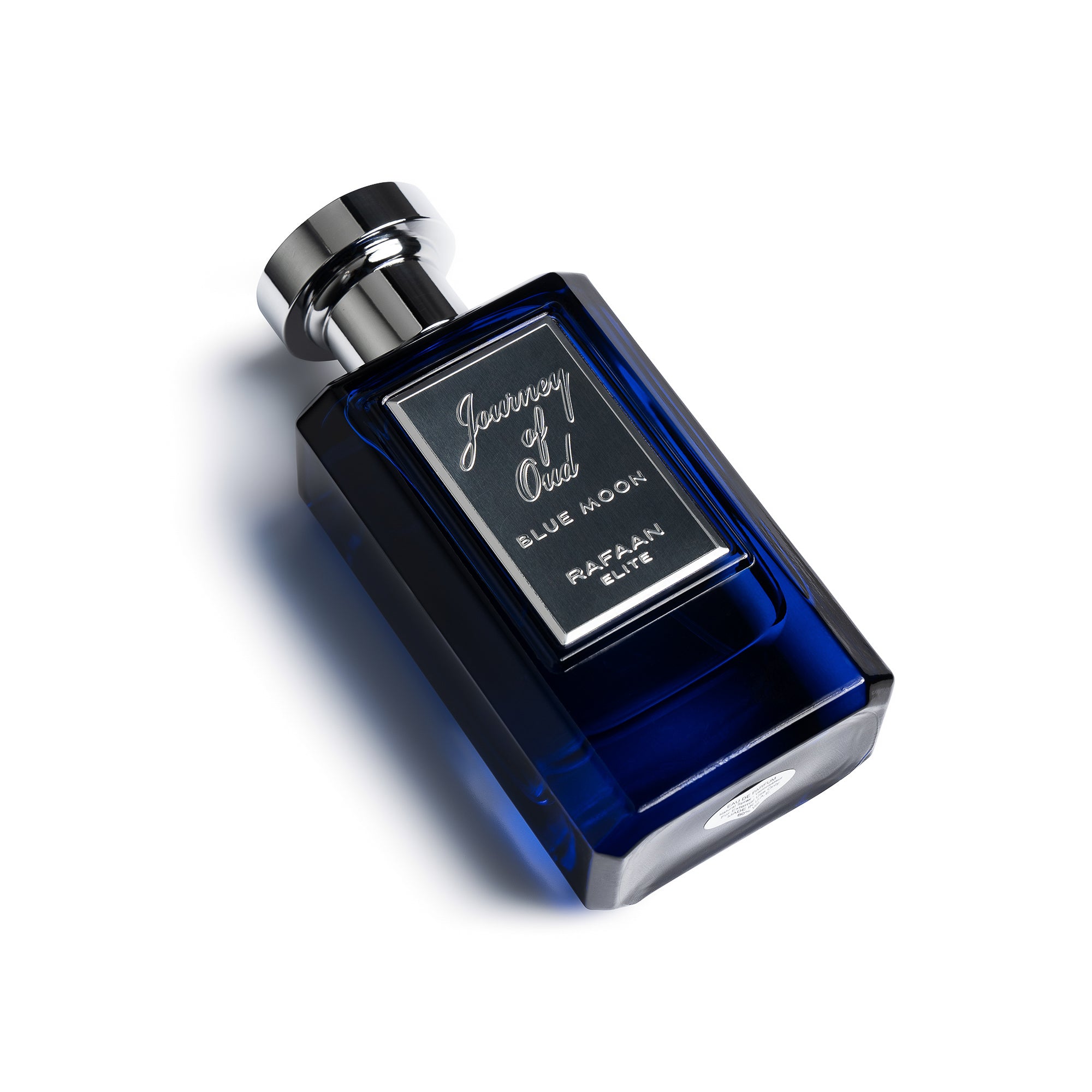 Journey of Oud Blue Moon Perfume Bottle Lying Down By La Parfum Galleria