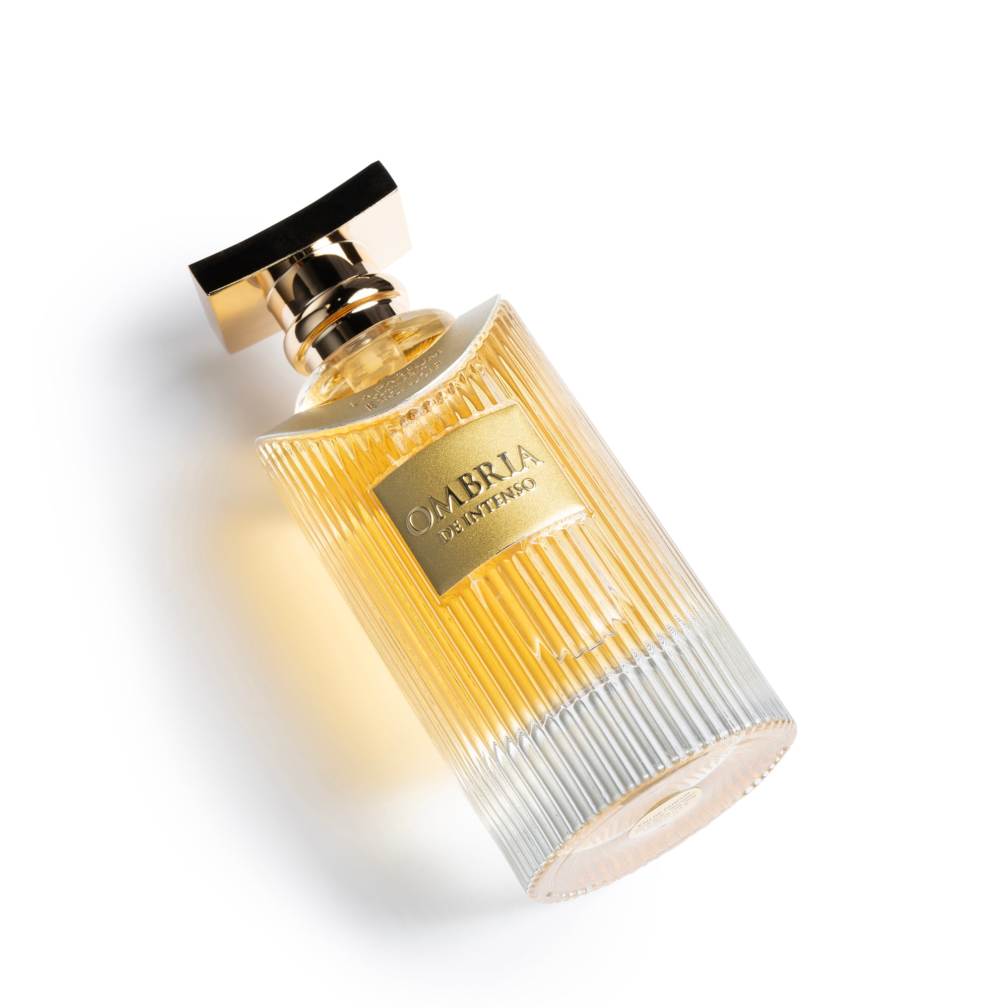 Ombria De Intenso Perfume Bottle Lying Down By La Parfum Galleria