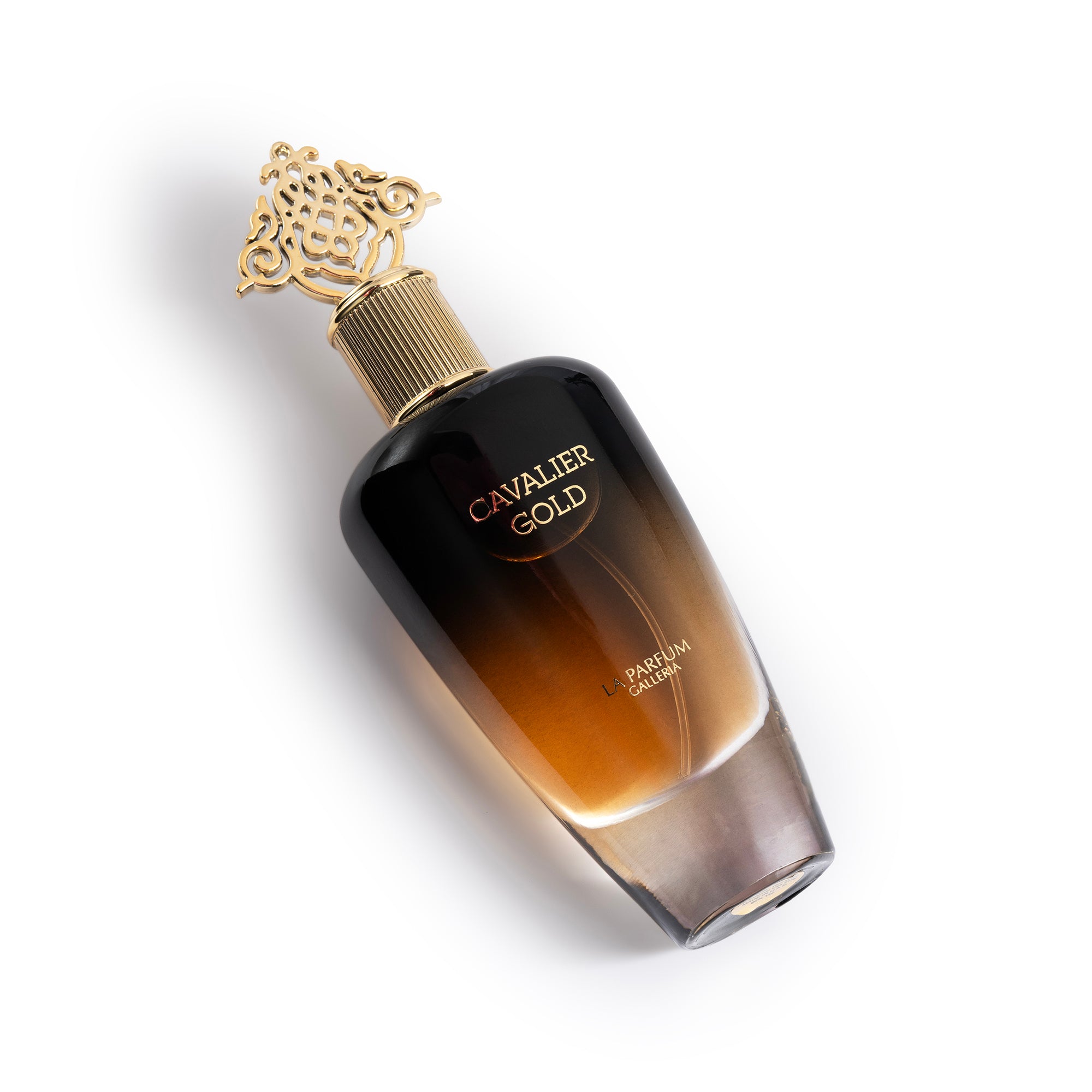 Cavalier Gold Perfume Bottle Lying Down By La Parfum Galleria