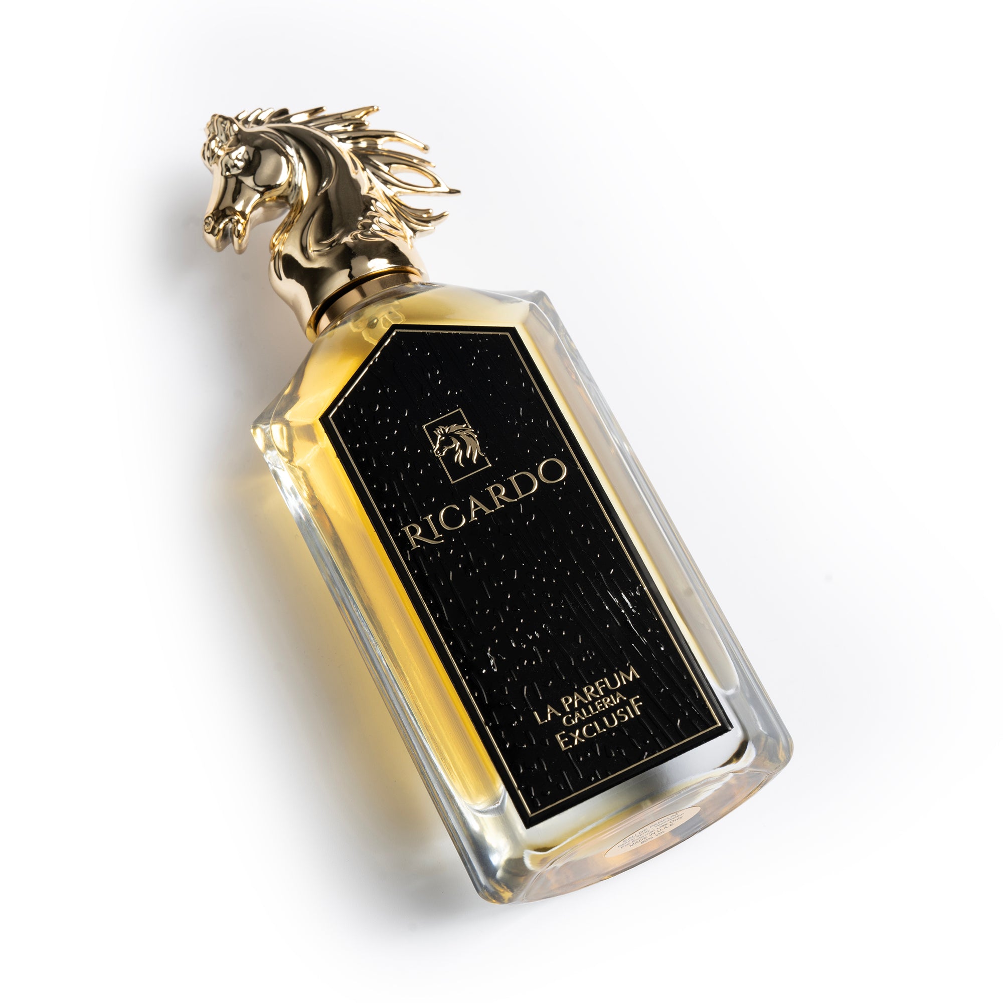 Ricardo Perfume Bottle Lying Down By La Parfum Galleria