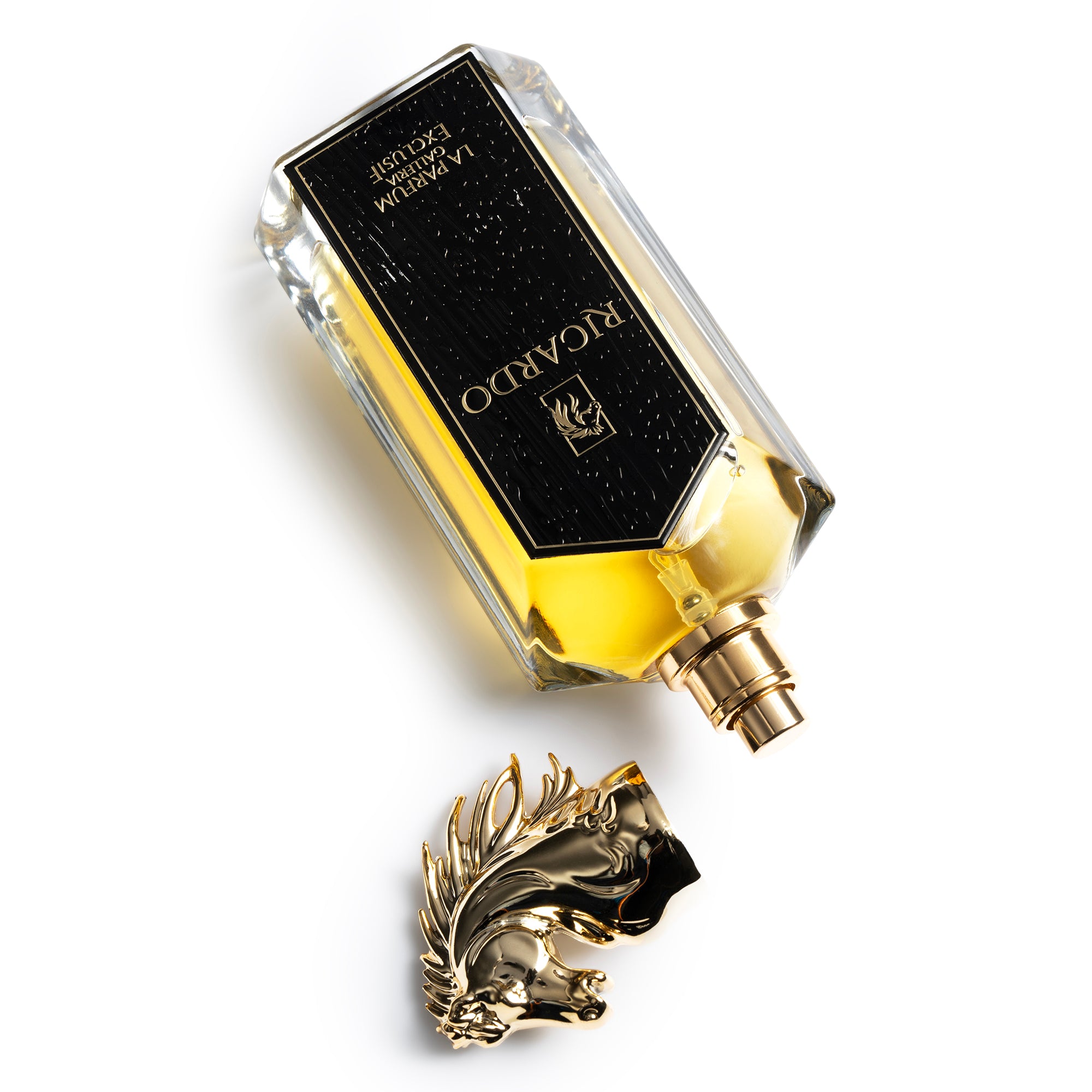 Ricardo Perfume Bottle With Cap off By La Parfum Galleria