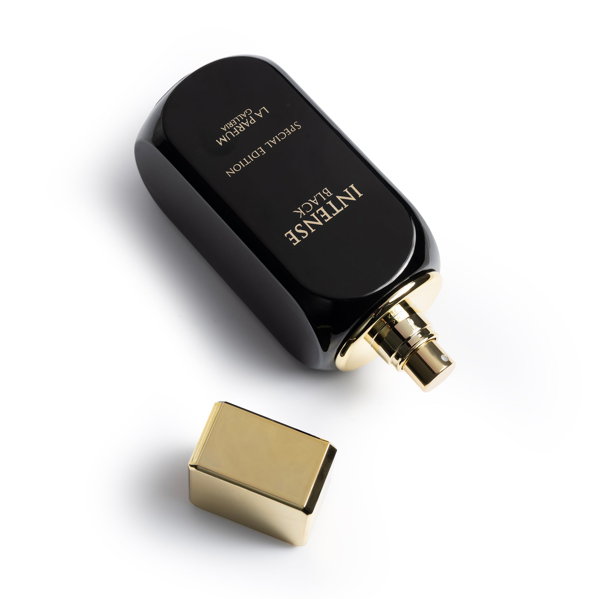 Intense Black Perfume Bottle With Cap Off By La Perfume Galleria