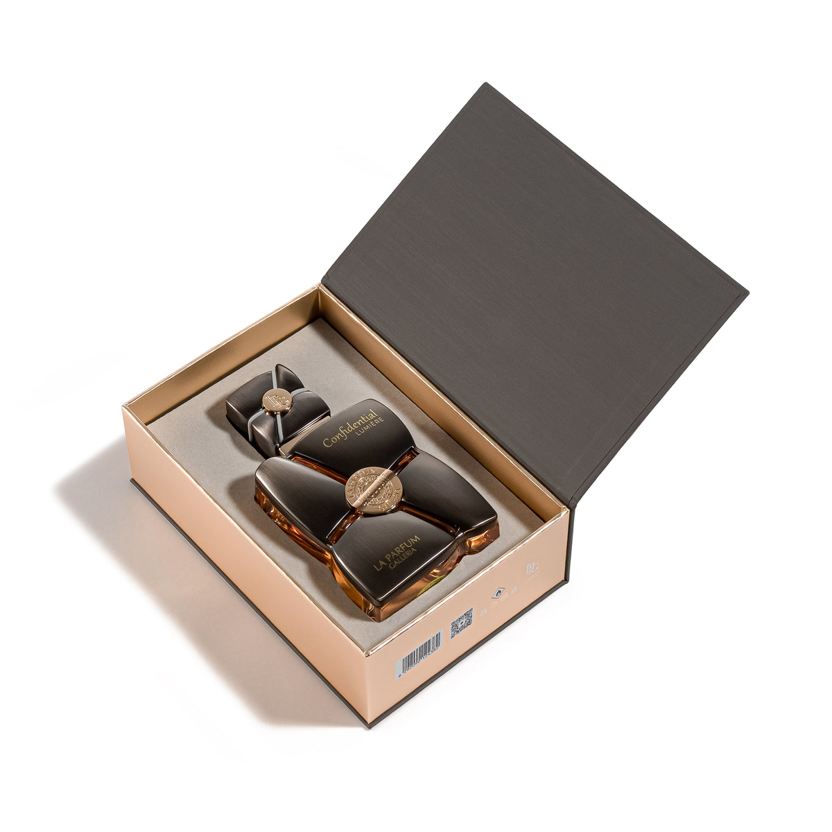Confidential Lumière Eau de Parfum 100ml bottle inside its open presentation box on a white background