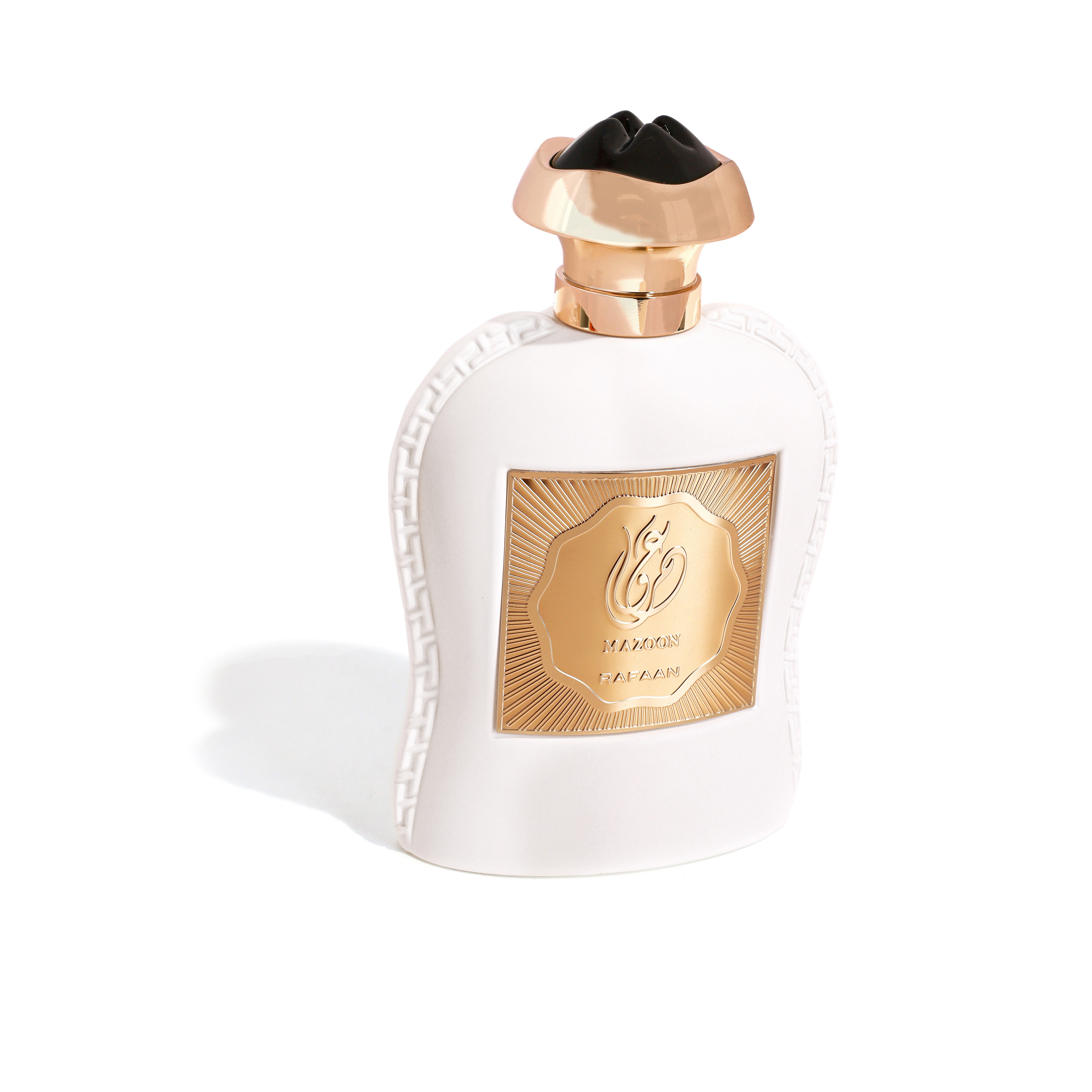 MAZOON RAFAAN Perfume bottle with gold label and rose gold cap on white background