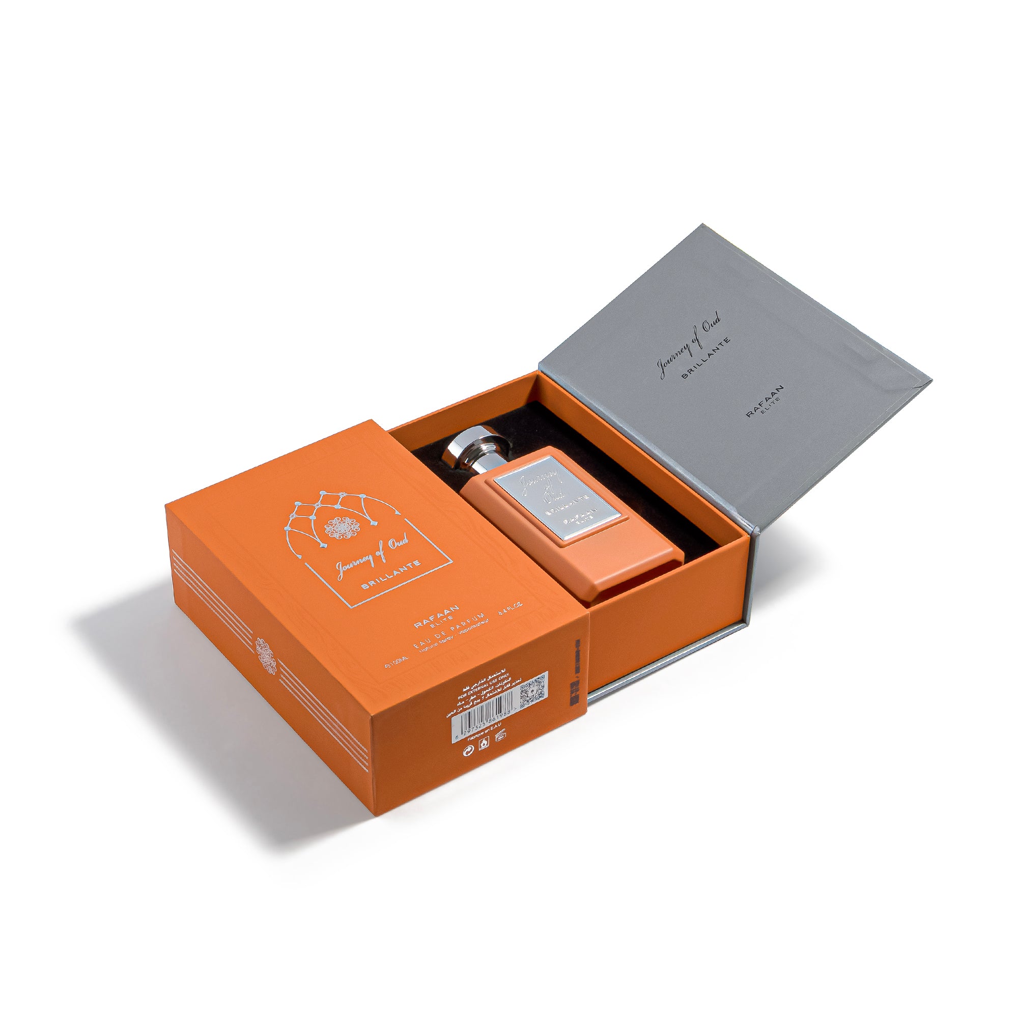 journey of oud brillante box with a silver bottle inside on a white background