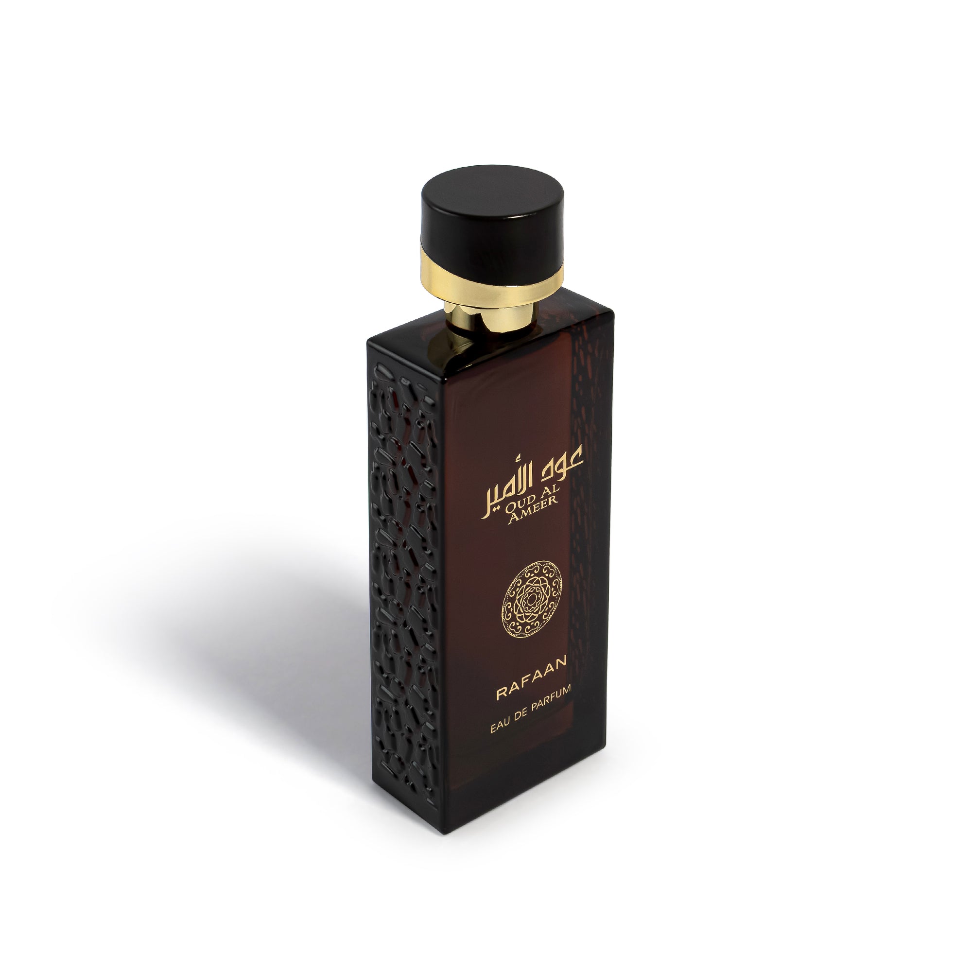 oud al ameer rafaan Perfume bottle with intricate design on a white background
