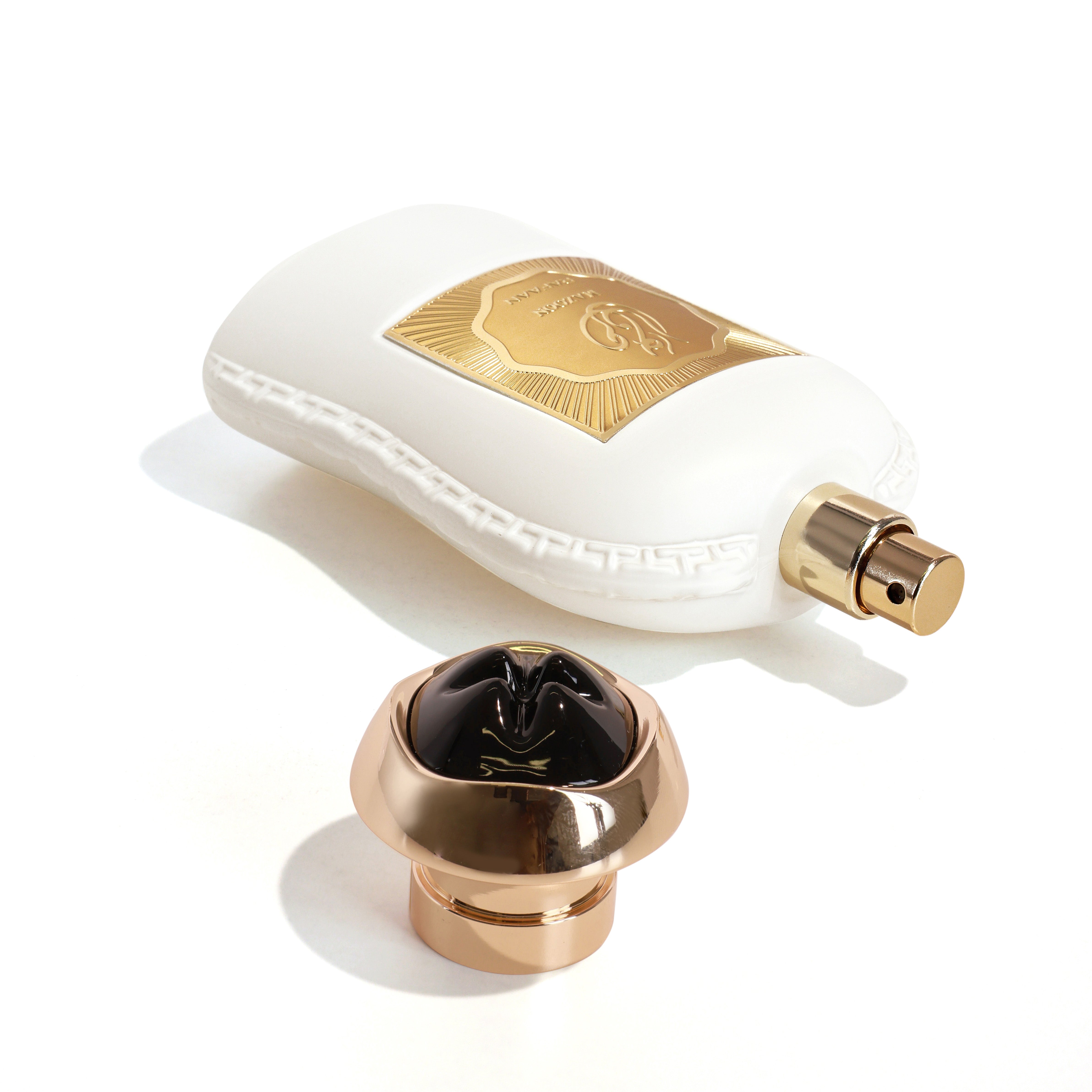 MAZOON RAFAAN perfume bottle with a black cap on a white background